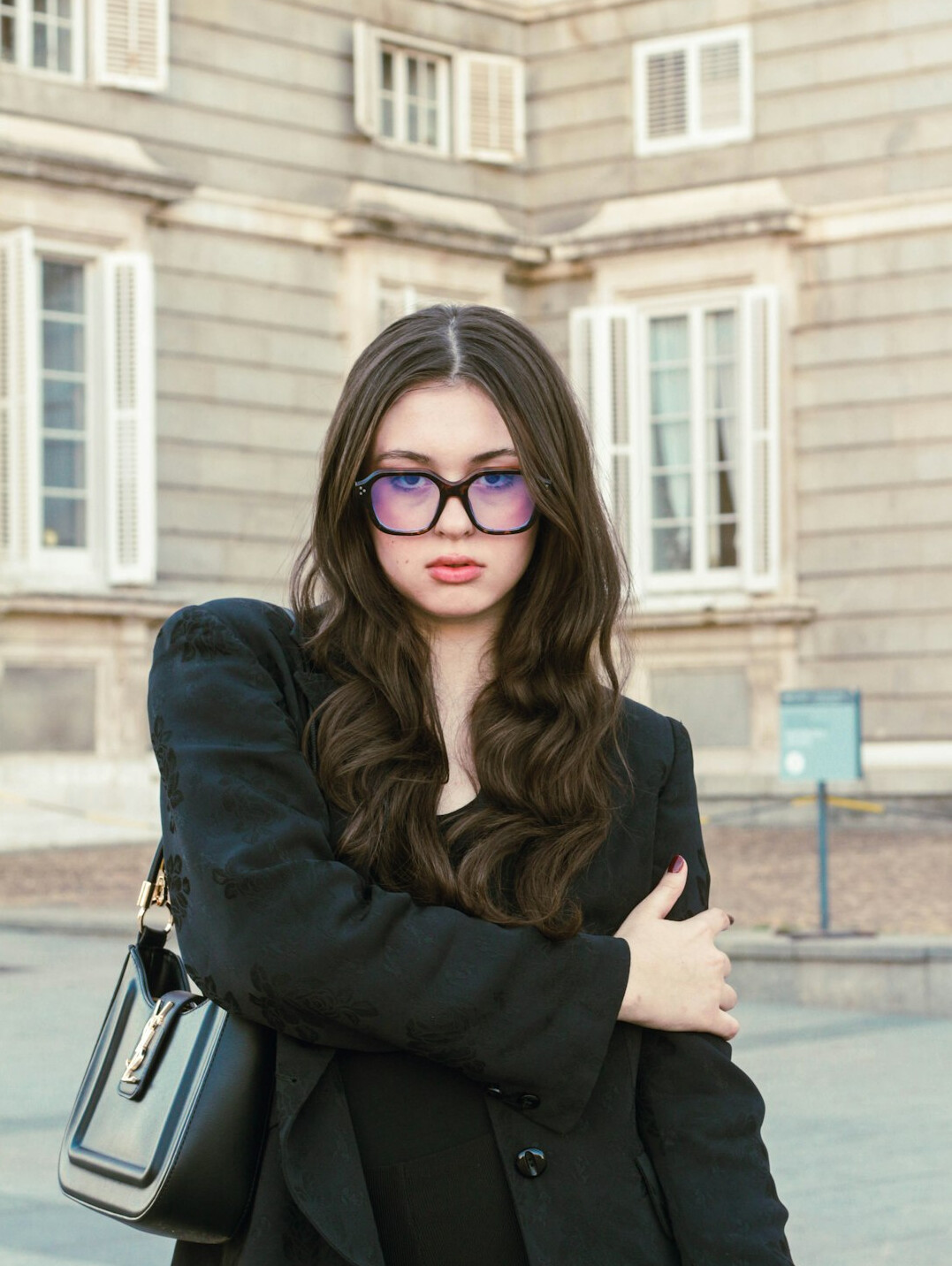 Studio portrait of a European businesswoman with glasses